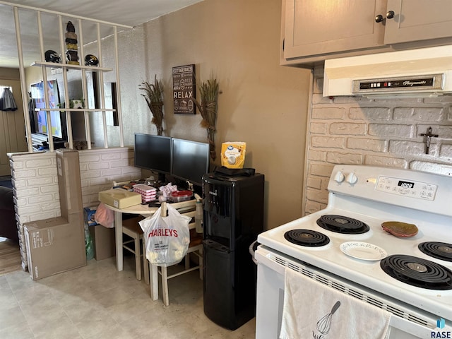 822 S Jessica Ave, Sioux Falls, SD 57103 - kitchen with white electric range oven, extractor fan, and light countertops