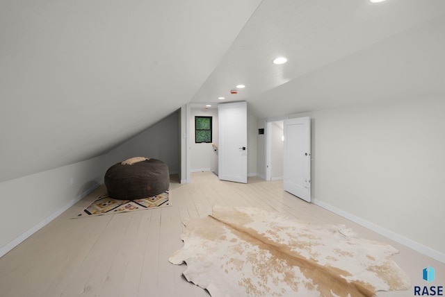 1709 S Duluth Ave, Sioux Falls, SD 57105 - bonus room with lofted ceiling, hardwood / wood-style floors, recessed lighting, and baseboards