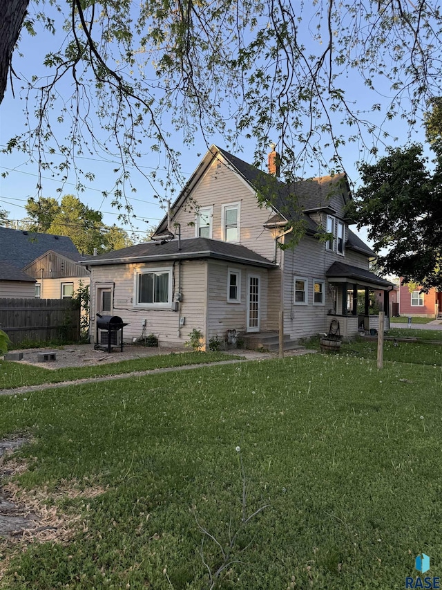 901 N Spring Ave, Sioux Falls, SD 57104 - back of property with a chimney