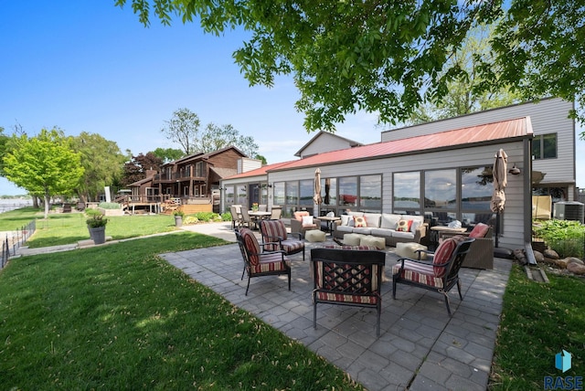6604 Peninsula Pt, Wentworth, SD 57075 - view of patio featuring an outdoor living space and central AC unit