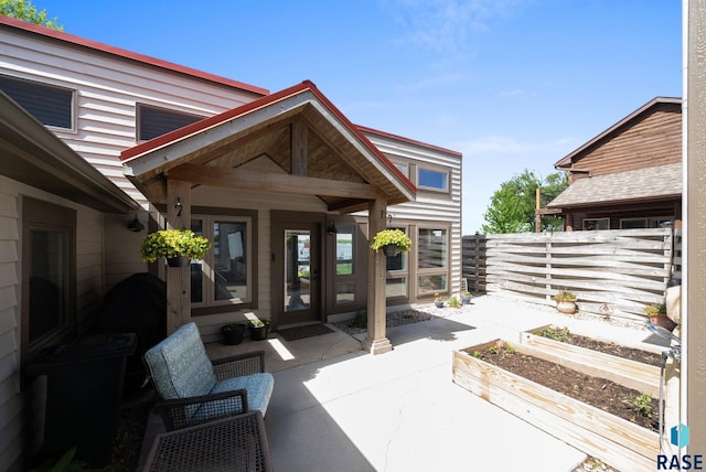 6604 Peninsula Pt, Wentworth, SD 57075 - view of patio featuring a garden