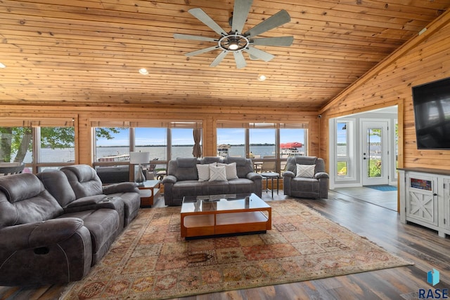 6604 Peninsula Pt, Wentworth, SD 57075 - living area with wooden walls, high vaulted ceiling, wood ceiling, a ceiling fan, and wood finished floors