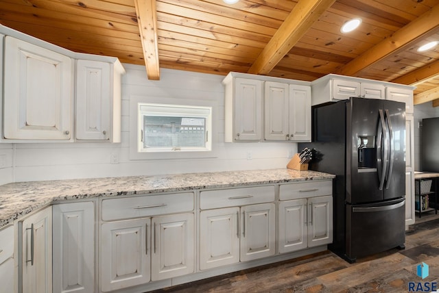 6604 Peninsula Pt, Wentworth, SD 57075 - kitchen featuring wooden ceiling with exposed beams, black refrigerator with ice dispenser, dark wood-style floors, white cabinets, and light stone counters
