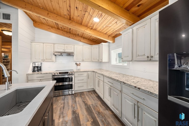6604 Peninsula Pt, Wentworth, SD 57075 - kitchen with refrigerator with ice dispenser, range with two ovens, a sink, wooden ceiling, and under cabinet range hood