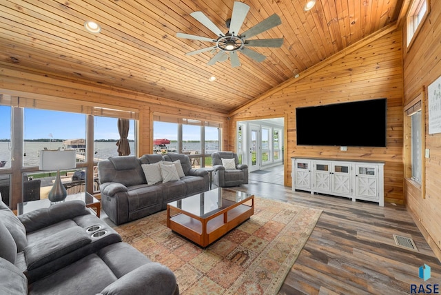 6604 Peninsula Pt, Wentworth, SD 57075 - living room featuring wood walls, ceiling fan, wooden ceiling, wood finished floors, and high vaulted ceiling