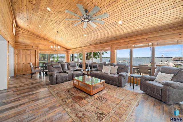 6604 Peninsula Pt, Wentworth, SD 57075 - living room with plenty of natural light, a chandelier, wood ceiling, wooden walls, and a water view