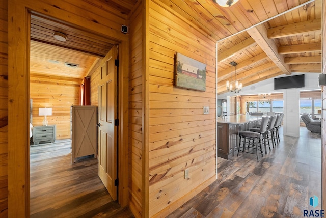 6604 Peninsula Pt, Wentworth, SD 57075 - hall with wood ceiling, wood walls, and dark wood-style flooring