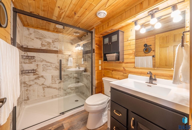 6604 Peninsula Pt, Wentworth, SD 57075 - full bath featuring toilet, vanity, a shower stall, wooden ceiling, and wood finished floors
