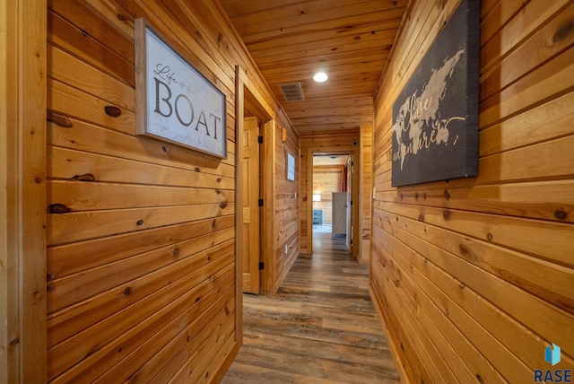 6604 Peninsula Pt, Wentworth, SD 57075 - hall with wood ceiling, wood walls, dark wood-style flooring, and recessed lighting