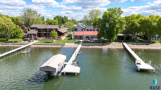 6604 Peninsula Pt, Wentworth, SD 57075 - dock area with boat lift and a water view