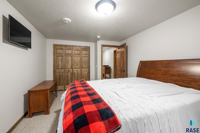 5205 S Eastwind Ave, Sioux Falls, SD 57108 - carpeted bedroom featuring a closet and baseboards
