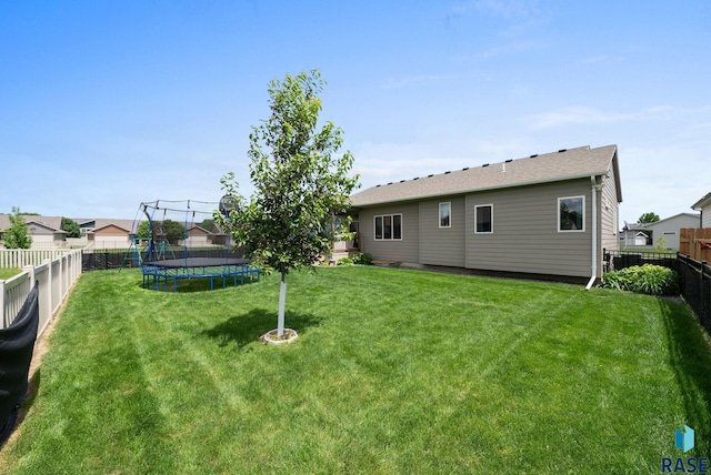 5205 S Eastwind Ave, Sioux Falls, SD 57108 - view of yard with a trampoline
