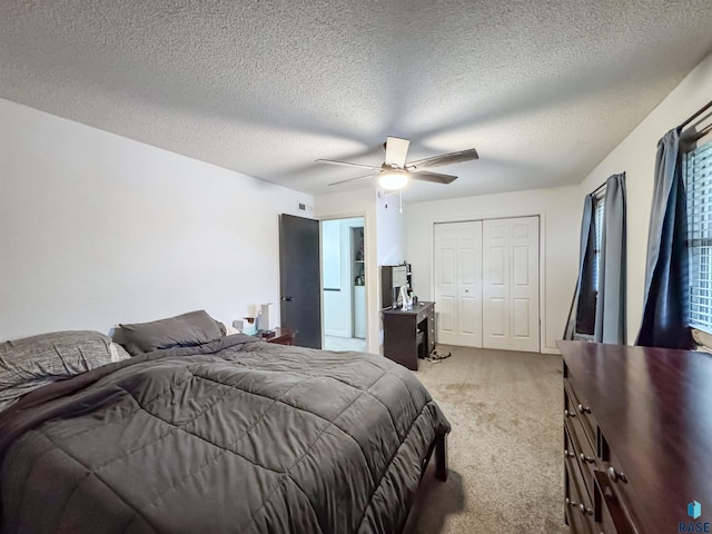 101 N Pipestone St Unit 3, Brandon, SD 57005 - bedroom featuring light carpet, ceiling fan, a closet, and a textured ceiling