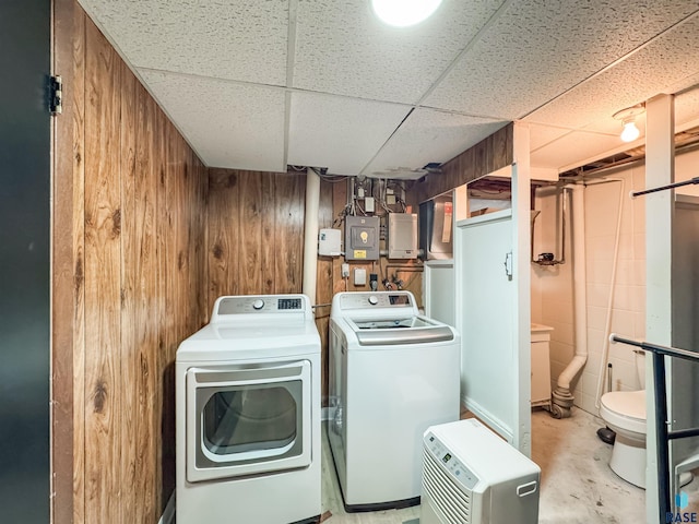 101 N Pipestone St Unit 3, Brandon, SD 57005 - laundry room with washing machine and clothes dryer and wooden walls