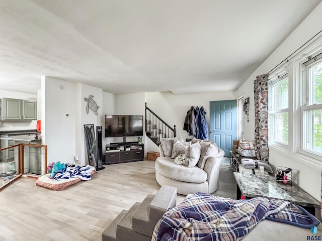 101 N Pipestone St Unit 3, Brandon, SD 57005 - living room with light wood-type flooring and stairway