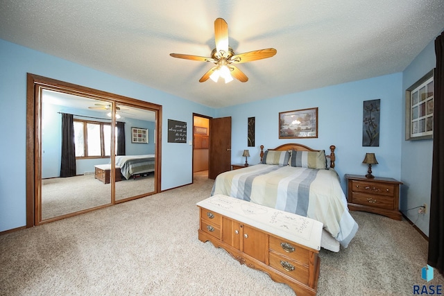 48224 266th St, Brandon, SD 57005 - bedroom with light colored carpet, ceiling fan, and a textured ceiling