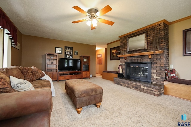 48224 266th St, Brandon, SD 57005 - living area featuring light colored carpet, ceiling fan, a brick fireplace, ornamental molding, and a textured ceiling