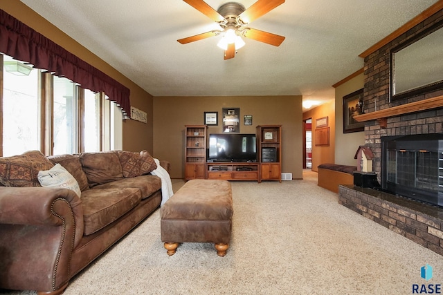 48224 266th St, Brandon, SD 57005 - living room featuring light colored carpet, a fireplace, and ceiling fan