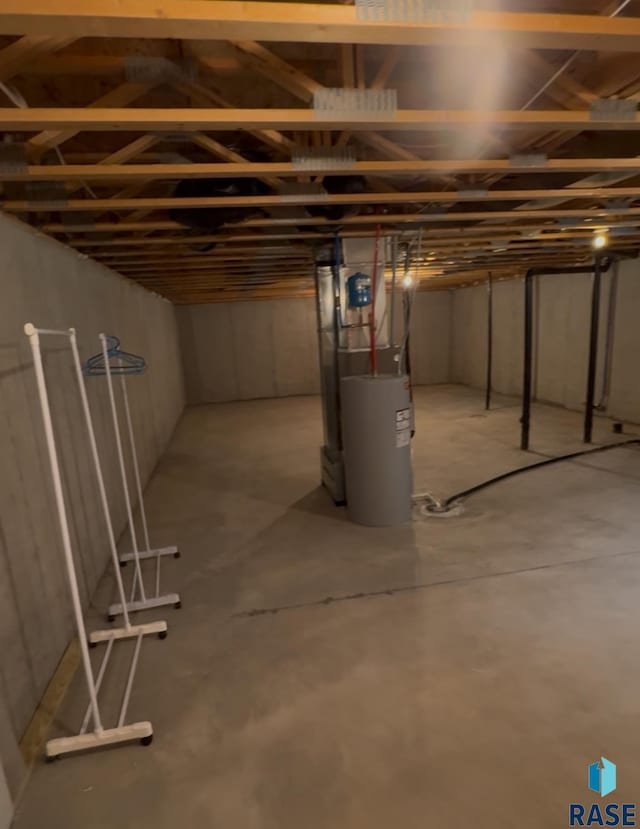 203 Cherry Ln, Chamberlain, SD 57325 - unfinished below grade area with water heater