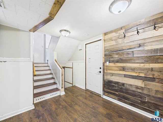 105 S Elm St, Lennox, SD 57039 - entrance foyer with wooden walls, wood finished floors, and stairs