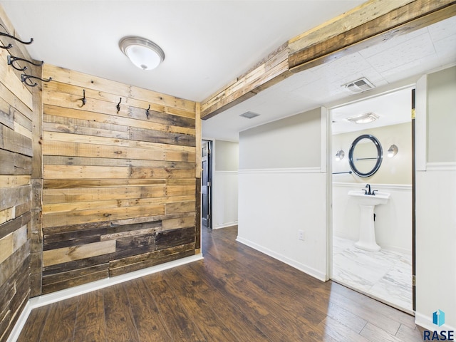 105 S Elm St, Lennox, SD 57039 - unfurnished room with wood walls and wood finished floors