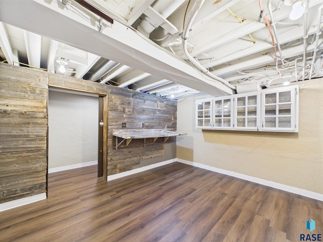 105 S Elm St, Lennox, SD 57039 - unfinished basement featuring baseboards and wood finished floors