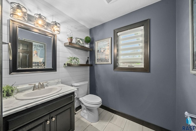 3909 E Shepherd St, Sioux Falls, SD 57103 - bathroom with toilet, vanity, and baseboards