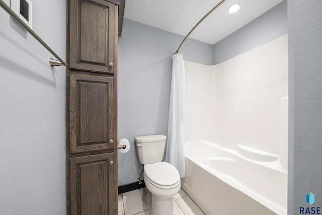 3909 E Shepherd St, Sioux Falls, SD 57103 - bathroom featuring shower / bath combination with curtain, toilet, and baseboards