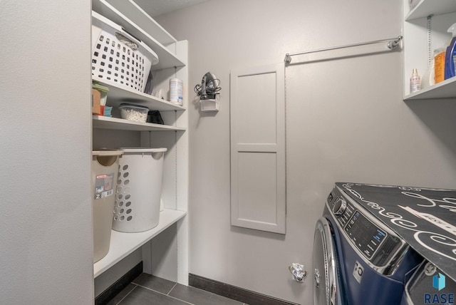 3909 E Shepherd St, Sioux Falls, SD 57103 - mudroom featuring washer and clothes dryer and dark tile patterned floors