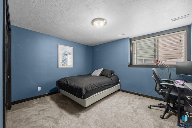 3909 E Shepherd St, Sioux Falls, SD 57103 - bedroom featuring baseboards, a textured ceiling, an office area, and carpet