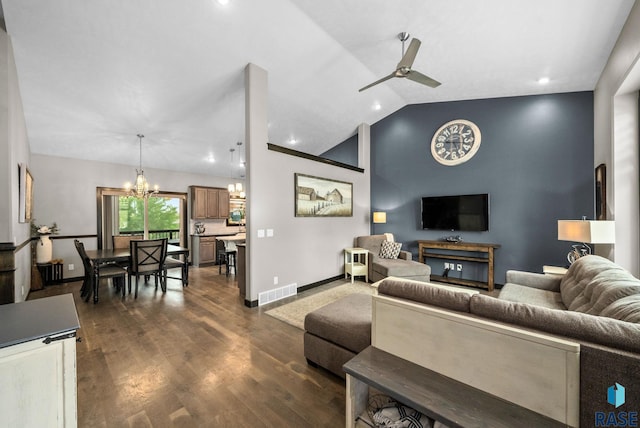 3909 E Shepherd St, Sioux Falls, SD 57103 - living room with a chandelier, vaulted ceiling, ceiling fan, dark wood-style floors, and baseboards