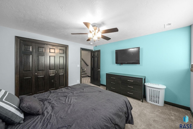 3909 E Shepherd St, Sioux Falls, SD 57103 - bedroom featuring light colored carpet, a closet, ceiling fan, and baseboards