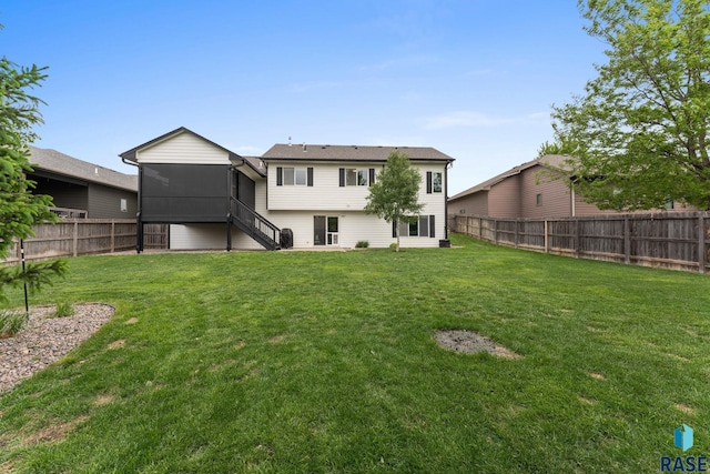 3909 E Shepherd St, Sioux Falls, SD 57103 - back of property with stairs and a sunroom