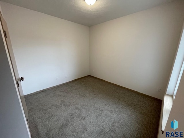 3408 S Heather Ave, Sioux Falls, SD 57106 - carpeted empty room with baseboards