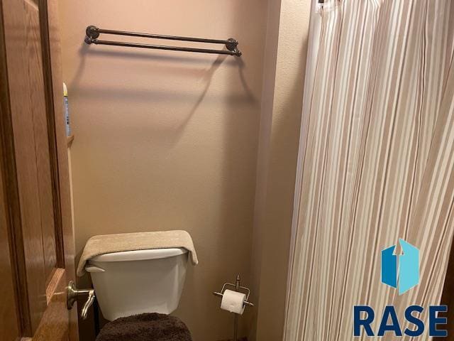 218 S Douglas St, Inwood, IA 51240 - bathroom with toilet