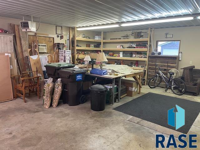 218 S Douglas St, Inwood, IA 51240 - storage room with a heating unit