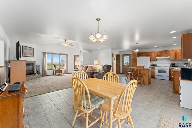 39240 210th St, Huron, SD 57350 - dining room with recessed lighting, ceiling fan, a chandelier, light colored carpet, and light tile patterned flooring