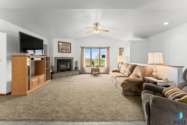 39240 210th St, Huron, SD 57350 - carpeted living area with ceiling fan, a fireplace, and vaulted ceiling