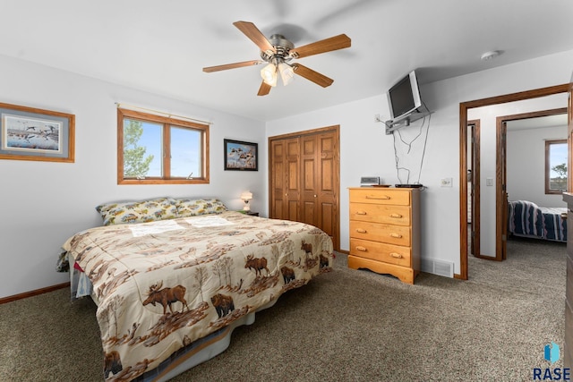 39240 210th St, Huron, SD 57350 - carpeted bedroom with a closet, baseboards, and ceiling fan
