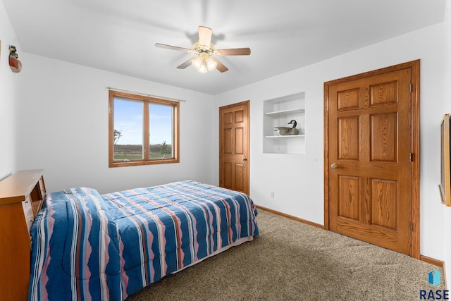 39240 210th St, Huron, SD 57350 - bedroom with carpet flooring, baseboards, and ceiling fan