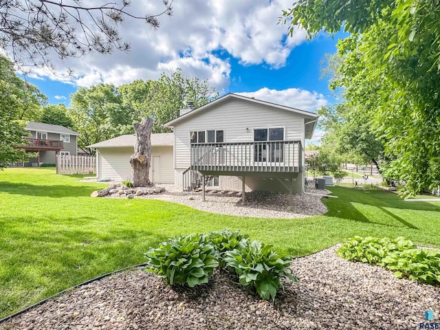 2405 E 51st St, Sioux Falls, SD 57103 - back of house featuring a wooden deck and stairway
