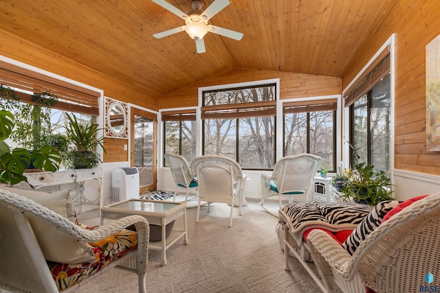 7005 W Strabane Trl, Sioux Falls, SD 57106 - sunroom featuring lofted ceiling, wooden walls, plenty of natural light, a ceiling fan, and wooden ceiling