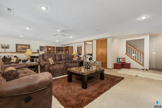 7005 W Strabane Trl, Sioux Falls, SD 57106 - living room featuring carpet flooring, ceiling fan, recessed lighting, stairs, and a textured ceiling