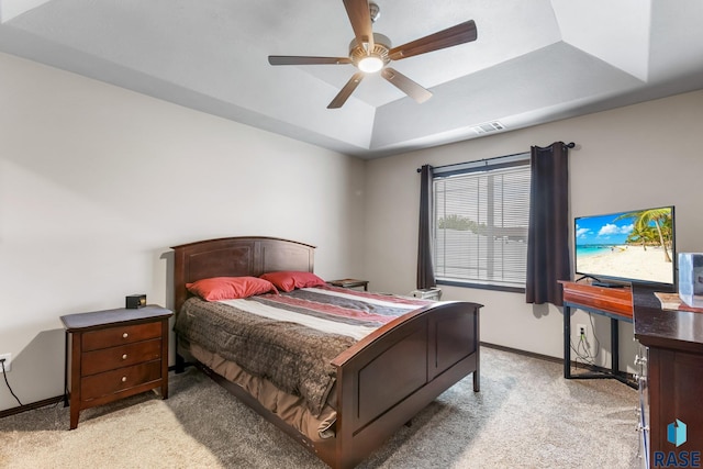6702 W Gresford Pl, Sioux Falls, SD 57106 - bedroom with light carpet, a raised ceiling, baseboards, and ceiling fan