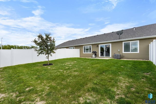 6702 W Gresford Pl, Sioux Falls, SD 57106 - back of property featuring central AC and a patio area