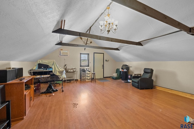 912 N Minnesota Ave, Sioux Falls, SD 57104 - additional living space featuring light wood-style floors, a chandelier, and a textured ceiling