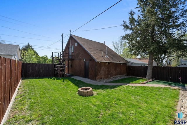 912 N Minnesota Ave, Sioux Falls, SD 57104 - view of yard featuring an outdoor fire pit and stairway