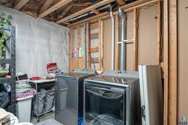 1716 E Tracy Ln, Sioux Falls, SD 57103 - laundry area with washing machine and clothes dryer