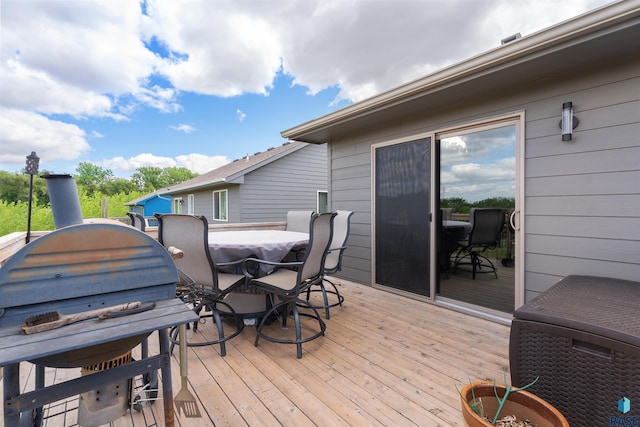 1716 E Tracy Ln, Sioux Falls, SD 57103 - wooden deck with outdoor dining area