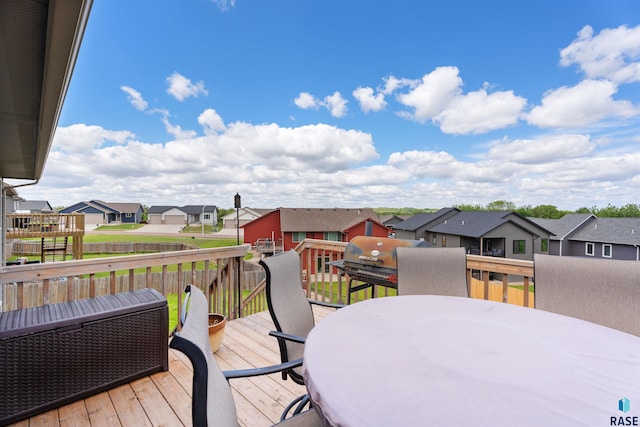 1716 E Tracy Ln, Sioux Falls, SD 57103 - wooden terrace featuring a residential view and outdoor dining area